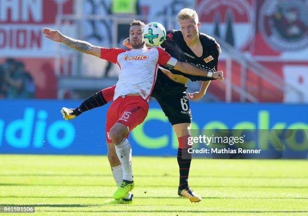 Marco Gruettner of SSV Jahn Regensburg and Kristian Pedersen of 1 FC Union Berlin during the Second Bundesliga match between Jahn Regensburg and...