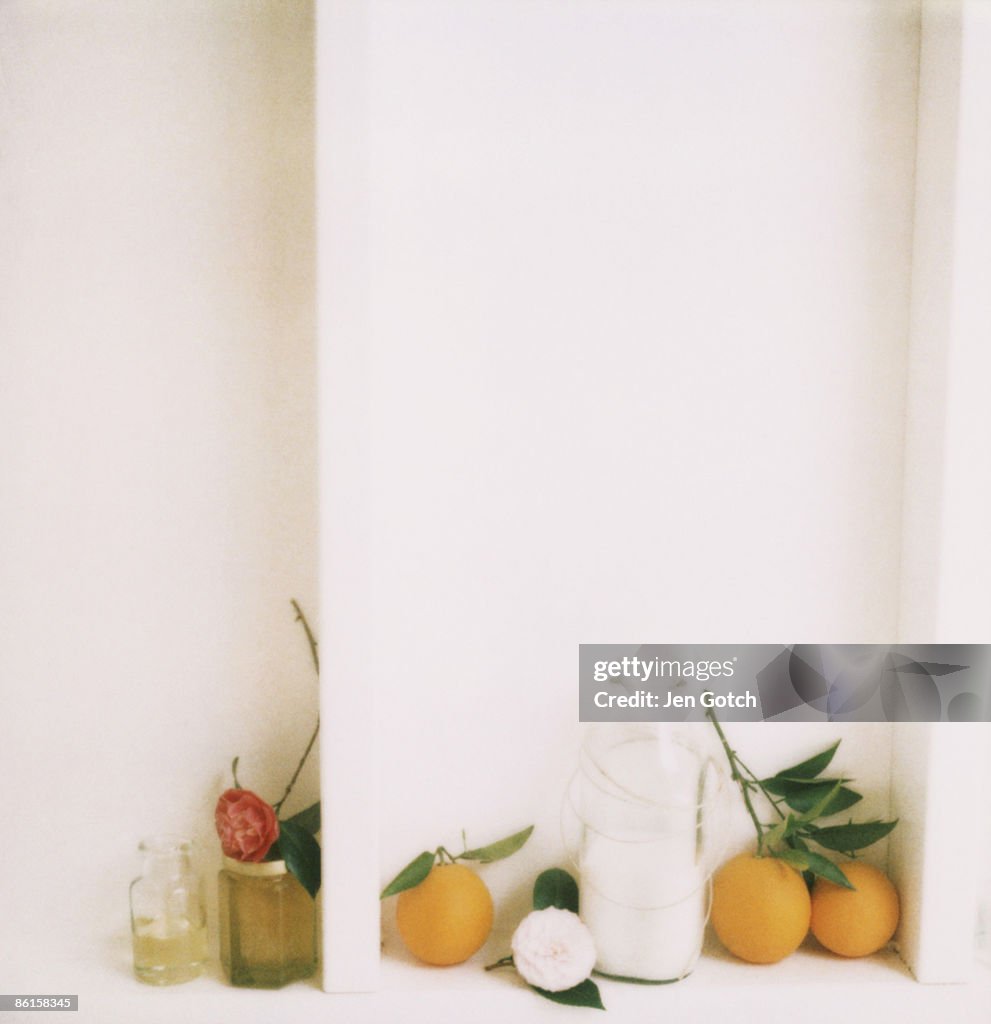 Oil, honey, milk, oranges, and Camillas flowers