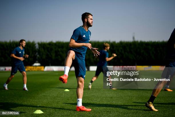 Miralem Pjanic during a Juventus traininig session at Juventus Center Vinovo on October 15, 2017 in Vinovo, Italy.