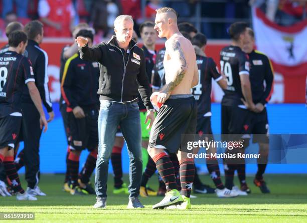 Coach Jens Keller and Sebastian Polter of 1.FC Union Berlin after the game between Jahn Regensburg and Union Berlin on october 15, 2017 in...