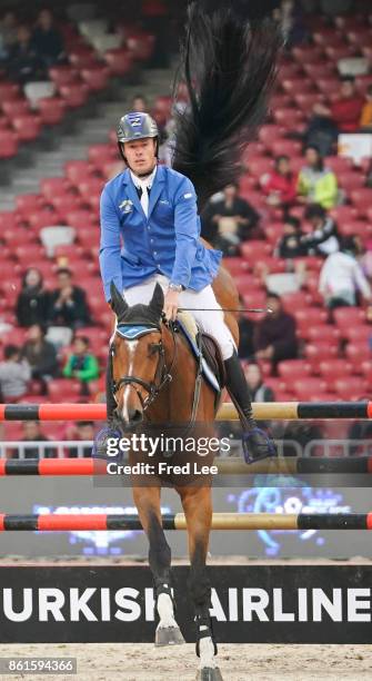 Christian Ahlmann of Germany during the jumping competition against the Longines Grand Prix at Birds Nest on October 15, 2017 in Beijing, China.