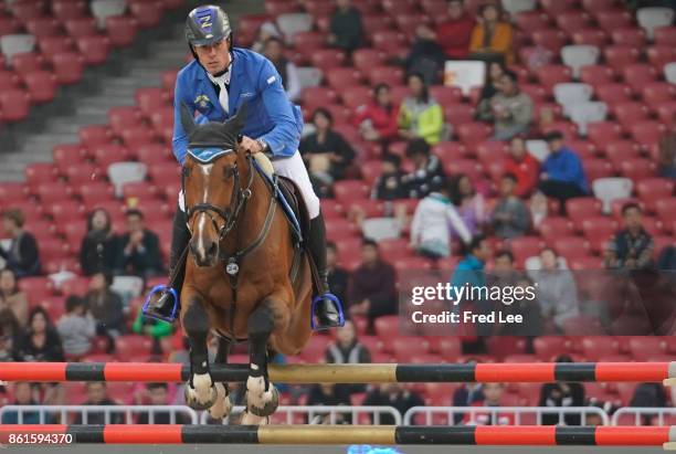 Christian Ahlmann of Germany is seen during the jumping competition of the LONGINES Equestrian Beijing Masters 2017 at Birds Nest on October 15, 2017...