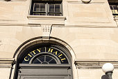 Exterior Of Municipal City Hall Sign In Window