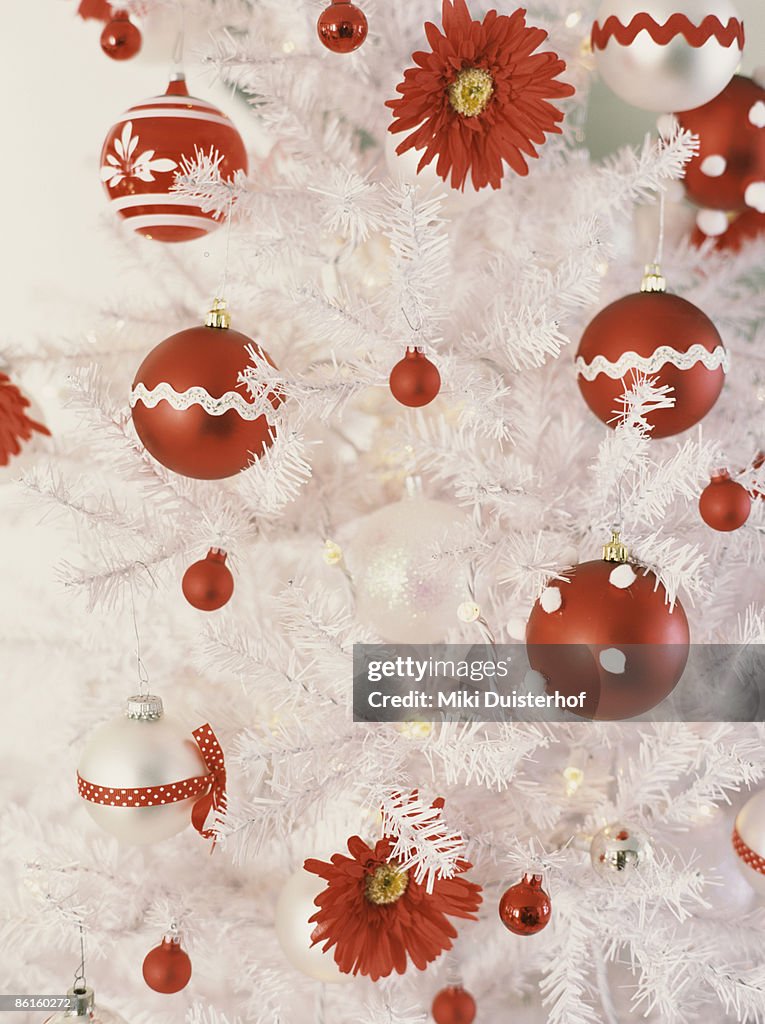 Ornaments and flowers on Christmas tree