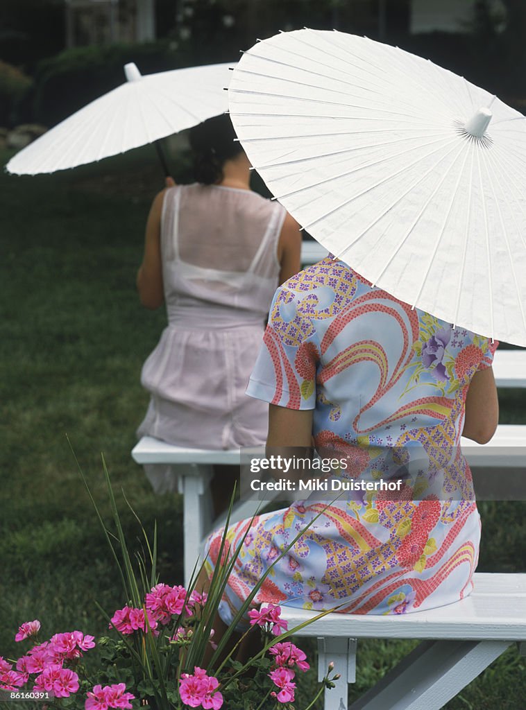 Women with parasols