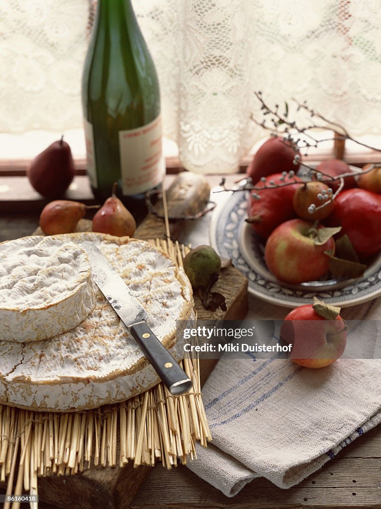 Cheese and fruit still life