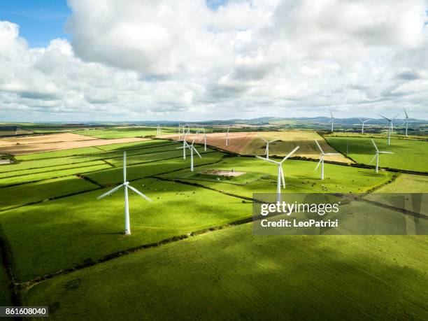 wind turbine fields in cornwall - sustainable energy uk stock pictures, royalty-free photos & images