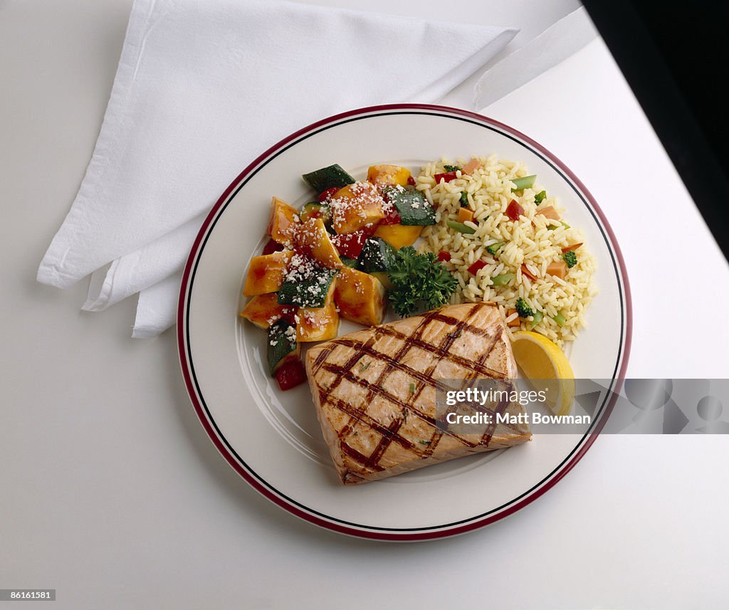 Grilled salmon with baked vegetables