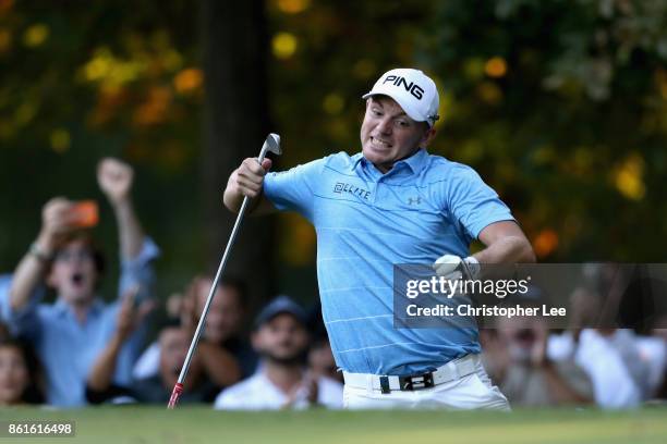 Matt Wallace of England celebrates after chipping in on the 17th during the final round of the 2017 Italian Open at Golf Club Milano - Parco Reale di...