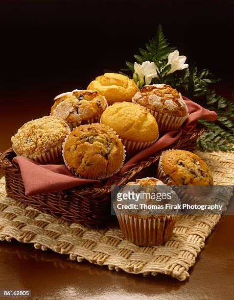 muffins in basket -  firak stock pictures, royalty-free photos & images