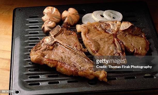 broiled t-bone steak -  firak stock pictures, royalty-free photos & images