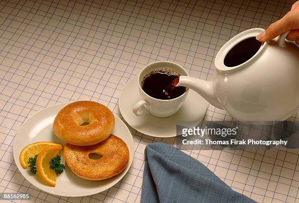 bagels and tea -  firak stock pictures, royalty-free photos & images