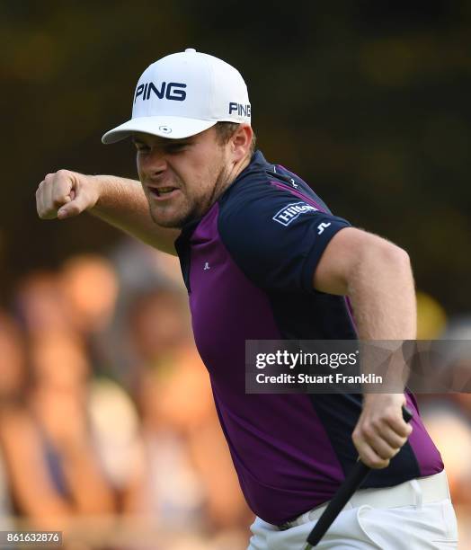 Tyrrell Hatton of England celebrates holeing the winning putt during the final round of The Italian Open at Golf Club Milano - Parco Reale di Monza...