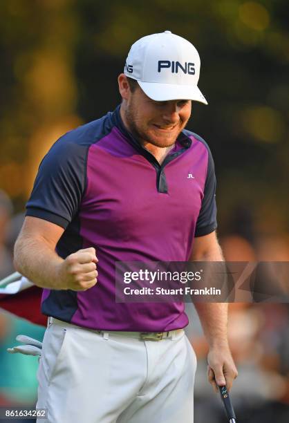 Tyrrell Hatton of England celebrates holeing the winning putt during the final round of The Italian Open at Golf Club Milano - Parco Reale di Monza...