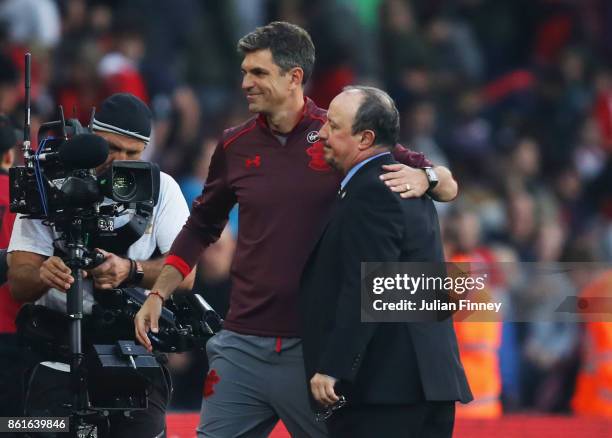 Mauricio Pellegrino, Manager of Southampton and Rafael Benitez, Manager of Newcastle United embrace at full time the Premier League match between...