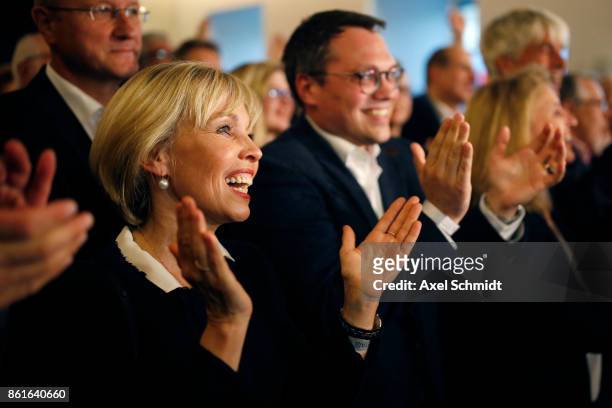 Doris Schröder-Köpf reacts as initial results give Stephan Weil, incumbent candidate of the German Social Democrats , a 1st-place finish with 37.5%...