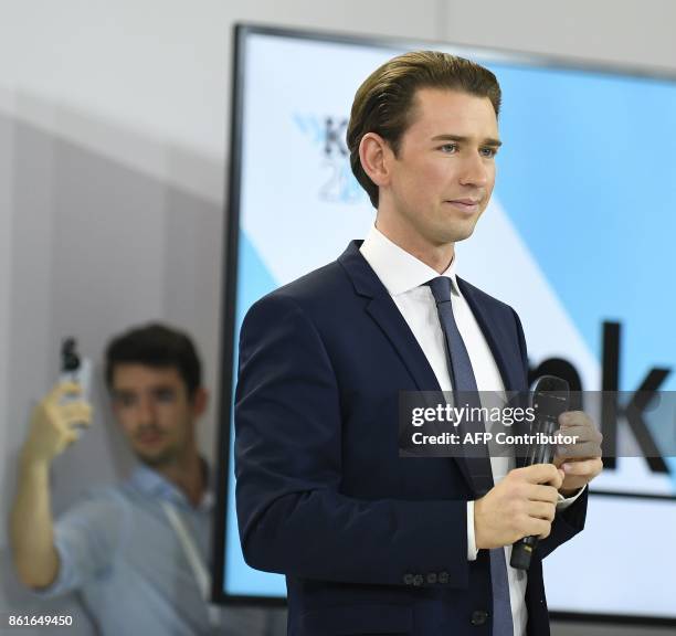 Austria's Foreign Minister and leader of Austria's centre-right People's Party Sebastian Kurz reacts during the party's election event following the...