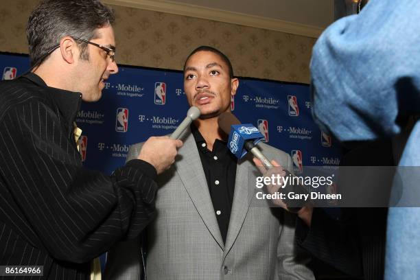 Derrick Rose of the Chicago Bulls speaks to reporters following the press conference where he was awarded the Eddie Gottlieb trophy presented to the...