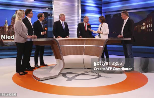 Lower Saxony's State Premier Stephan Weil of the Social democratic SPD party and Bernd Althusmann , top candidate of the conservative Christian...