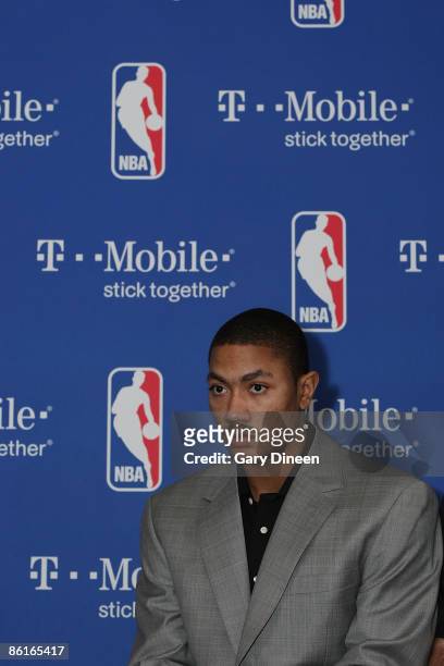 Derrick Rose of the Chicago Bulls sits on the stage prior to receiving the Eddie Gottlieb trophy presented to the T-Mobile NBA Rookie of the Year on...