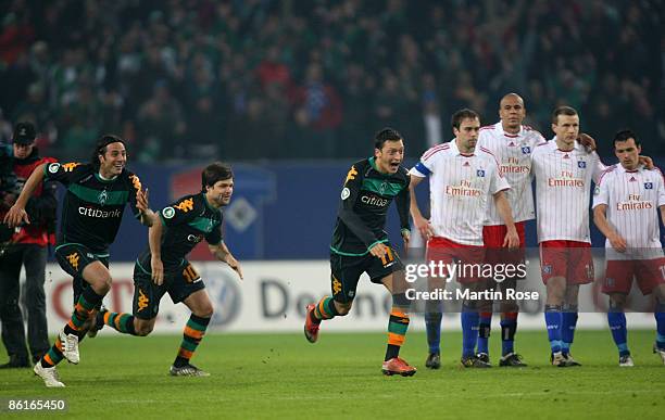 Claudio Pizarro, Diego and Mesut Oezil of Bremen celebrate after the DFB Cup Semi Final match between Hamburger SV and SV Werder Bremen at the HSH...