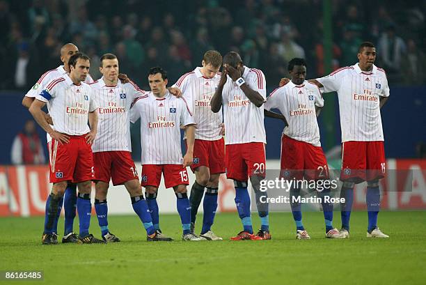 Joris Mathijsen, Alex Silva, Michael Gravgaard, Piotr Trochowski, Marcell Jansen,Guy Demel, Jonathan Pitroipa and Jerome Boateng of Hamburg look...