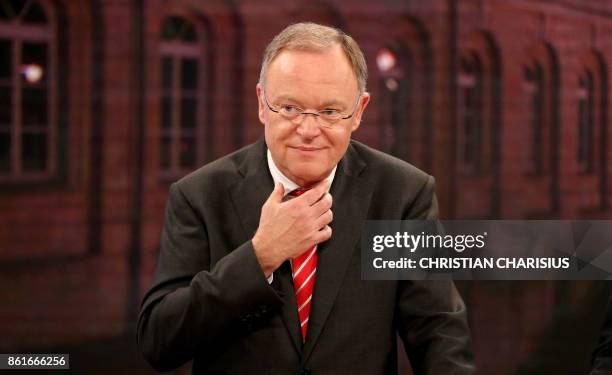 Lower Saxony's State Premier Stephan Weil of the Social democratic party reacts during a television debate on the election results of the...