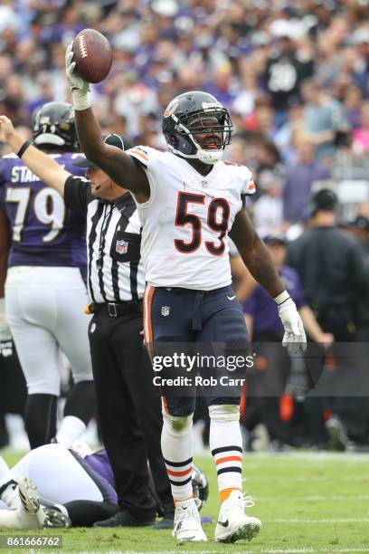 Inside Linebacker Danny Trevathan of the Chicago Bears celebrates after recovering a fumble against the Baltimore Ravens at M&T Bank Stadium on...