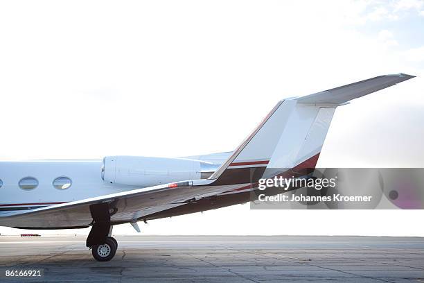 detail of private jet at tarmac - private jet stockfoto's en -beelden