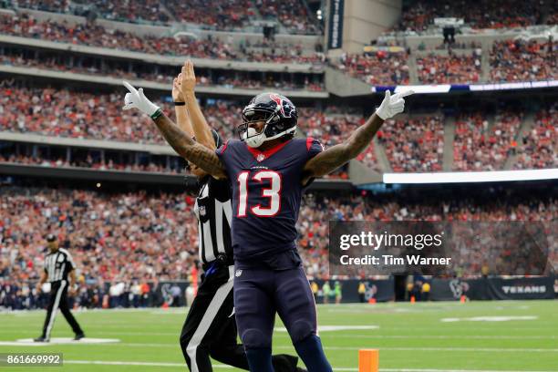 Braxton Miller of the Houston Texans celebrates after a touchdown in the second quarter against the Cleveland Browns at NRG Stadium on October 15,...