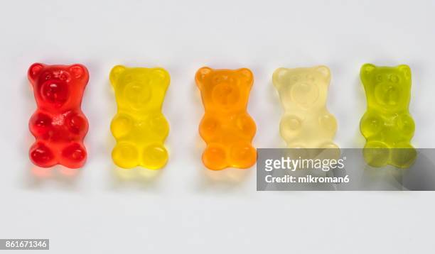 close-up of gummy bears candies - jelly sweet stock pictures, royalty-free photos & images