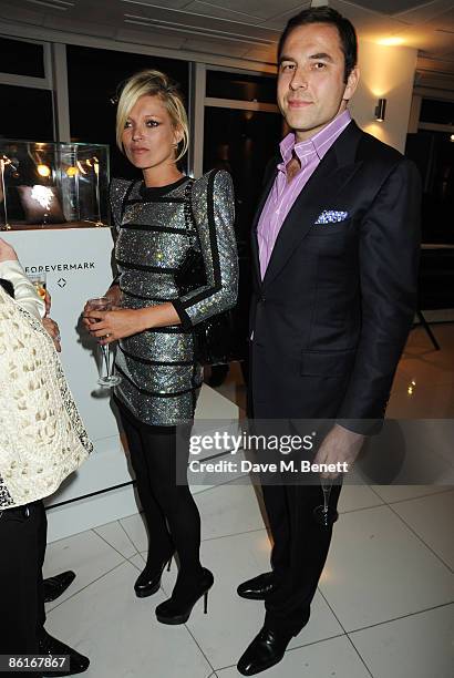 David Walliams and Kate Moss attend the launch party of Shaun Leane's White Light crafted for Forevermark hosted by Steinmetz, at the Millbank Tower...