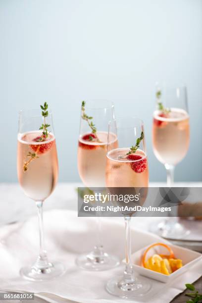 rose champagne cocktails - raspberry cocktail stock pictures, royalty-free photos & images