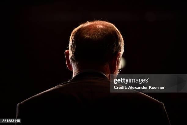 Stephan Weil, incumbent candidate of the German Social Democrats , speaks and celebrates with supporters following initial results that give the SPD...