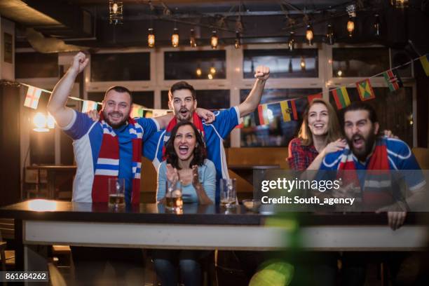 friends at the bar - rugby match stock pictures, royalty-free photos & images