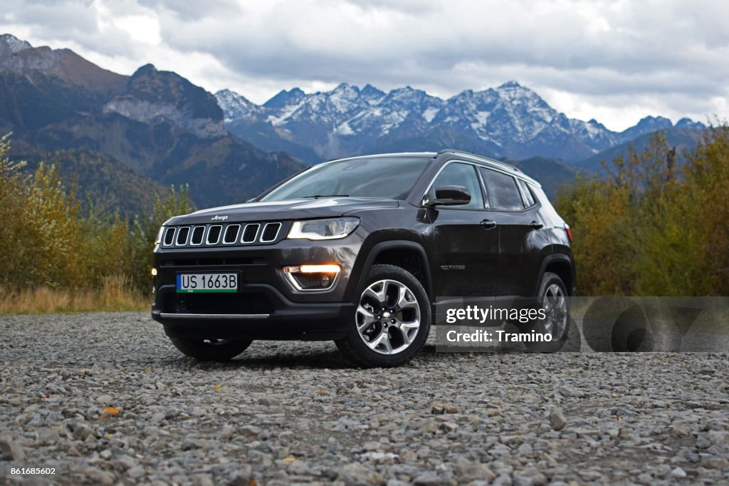 Jeep Compass on the rocky square