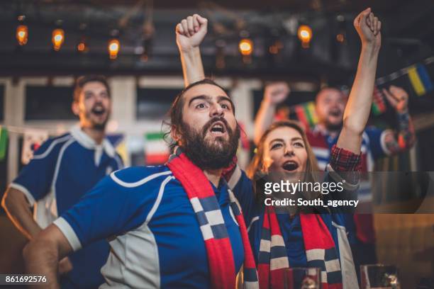 friends cheering - match sport stock pictures, royalty-free photos & images