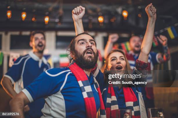 friends cheering - rugby match stock pictures, royalty-free photos & images