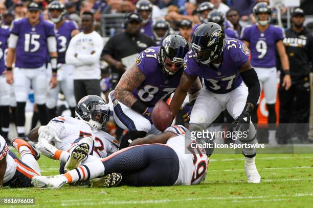 Baltimore Ravens tight end Maxx Williams fumbles in the second quarter and the ball is recovered by Chicago Bears inside linebacker Danny Trevathan...