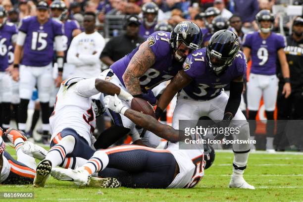 Baltimore Ravens tight end Maxx Williams fumbles in the second quarter and the ball is recovered by Chicago Bears inside linebacker Danny Trevathan...