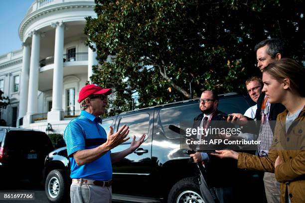Senator Rand Paul talks with reporters after returning to the White House in Washington, DC, with US President Donald Trump after golfing at the...