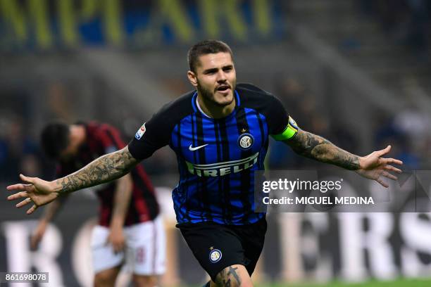 Inter Milan's Captain Argentinian forward Mauro Icardi celebrates after scoring during the Italian Serie A football match Inter Milan Vs AC Milan on...