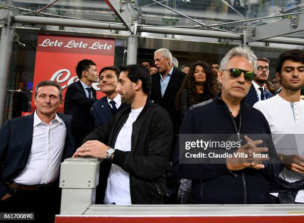 Internazionale Milano board member Nicola Volpi, sports direction of Football Club Inter Javier Zanetti, Diego Milito and Andrea Bocelli attend...