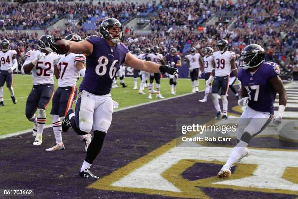 Tight End Nick Boyle of the Baltimore Ravens celebrates after catching a two point conversion in the fourth quarter against the Chicago Bears at M&T...