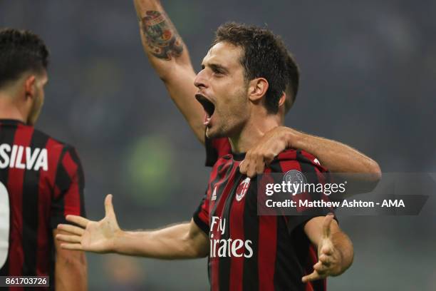 Giacomo Bonaventura of AC Milan celebrates after scoring a goal to make it 2-2 during to the Serie A match between FC Internazionale and AC Milan at...