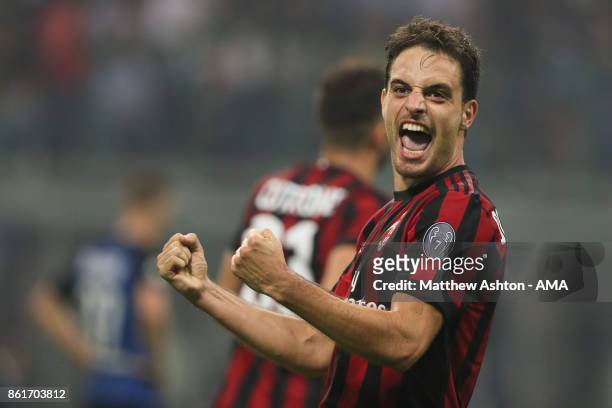 Giacomo Bonaventura of AC Milan celebrates after scoring a goal to make it 2-2 during to the Serie A match between FC Internazionale and AC Milan at...