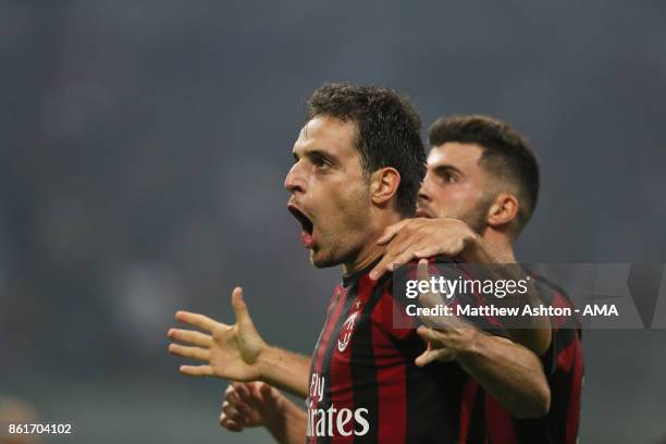 Giacomo Bonaventura of AC Milan celebrates after scoring a goal to make it 2-2 during to the Serie A match between FC Internazionale and AC Milan at...