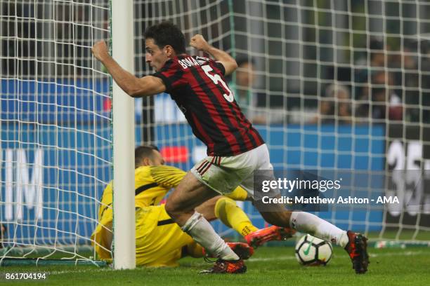 Giacomo Bonaventura of AC Milan celebrates after scoring a goal to make it 2-2 during to the Serie A match between FC Internazionale and AC Milan at...