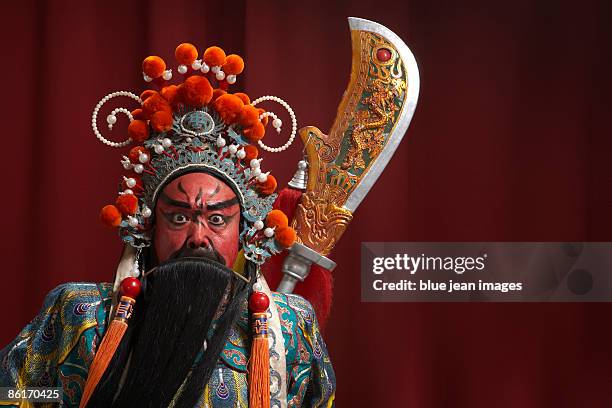 guang gong, ancient chinese general in beijing opera costume, represents protection and wealth - guan yu stock pictures, royalty-free photos & images