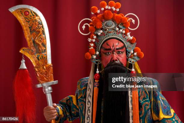 guang gong, ancient chinese general in beijing opera costume, represents protection and wealth - guan yu stock pictures, royalty-free photos & images